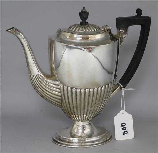 An Edwardian demi-fluted silver oval coffee pot, gross 19 oz.